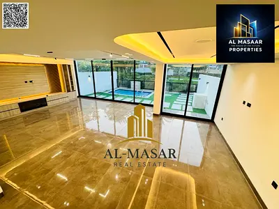 Villa in Al Zorah, Ajman, fully smart, with private pool, electricity, water, and air conditioning included. Freehold ownership for all nationalities.