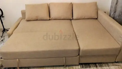 Ikea Beige L-shaped Sofa Bed with Cushions - Good Condition