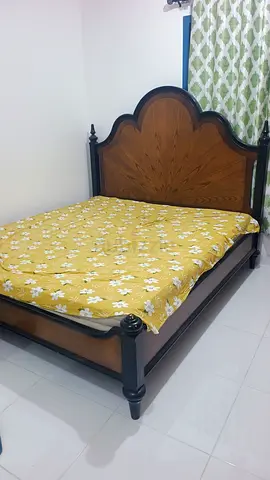 Solid Wood Double Bed with Decorative Headboard - Good Condition