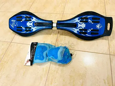 Blue RipStik-style Caster Board with Knee/Elbow Pads