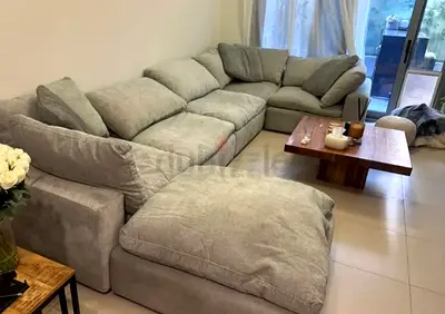 Great Condition Pan Emirates Pianca corner feather filled sofa with ottoman