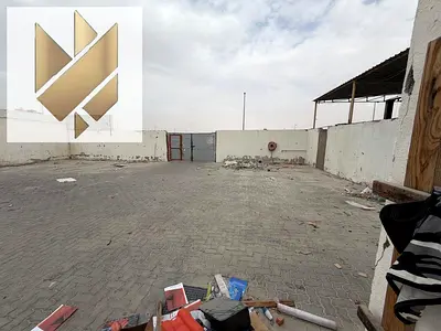 Open Yard for Rent in Al Sajja Size: 10,000 sq ft Access: Easy truck entry and wide open space for movement