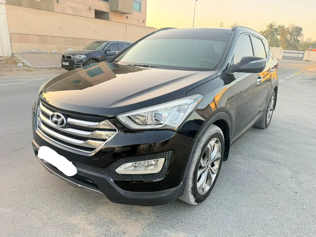 Hyundai Santa Fe 2014 — photo 1 of 18