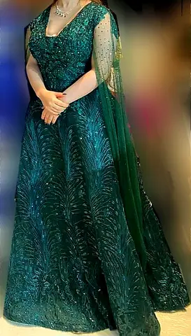 Party dresses Emerald color with crystal. Still new Size M-L