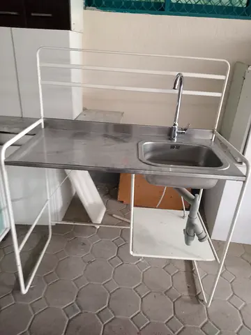 Compact stainless steel sink unit with tap and white metal frame Ikea brand
