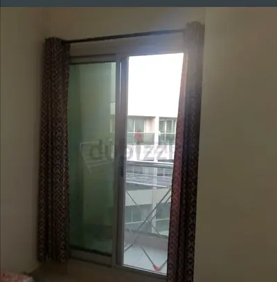 Master Bedroom with balcony available in Karama