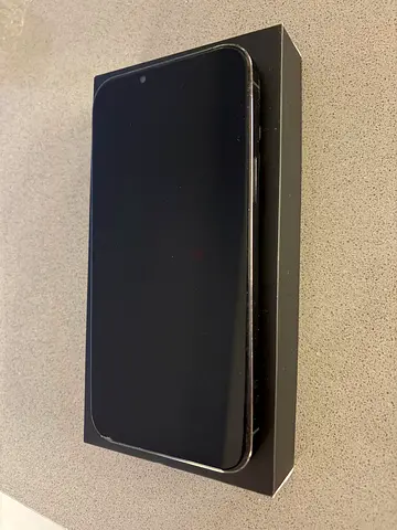 Used iPhone with original box - good condition