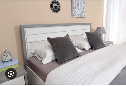Modern white and grey double bed frame with headboard