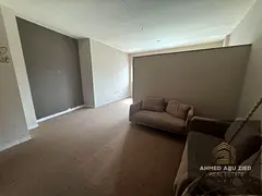 Largest Studio for Annual Rent in Falcon Tower, Al Rashidiya 2 | Semi‑Separate Kitchen | Built‑i