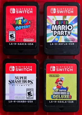 Set of 4 Nintendo Switch - Mario Odyssey, Smash Ultimate, Mario Party, Mario Bros. U Deluxe