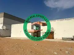 Warehouse and 20 Labour Rooms Available For Sale in Umm Al Quwain