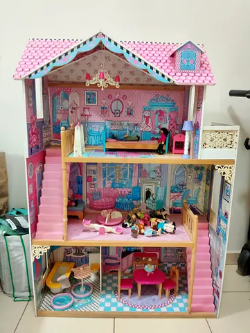 Doll House With Accessories In  Very Good Condition