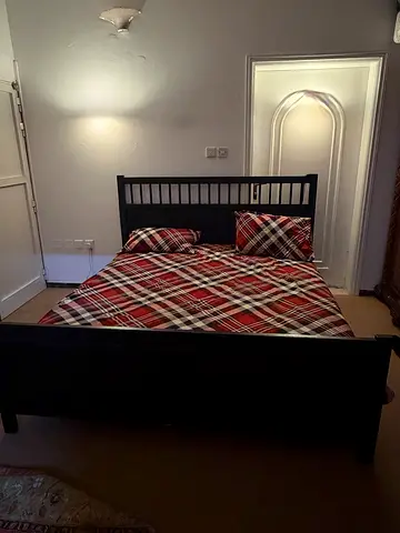 Solid wood double bed frame with headboard and footboard - dark finish