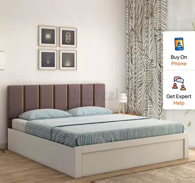 Double bed frame with upholstered headboard — white base, brown padded headboard with mattress
