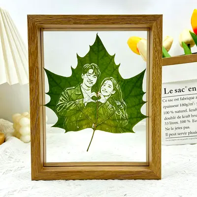 Custom leaf-carved photo frames