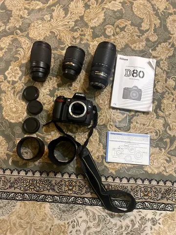 Nikon D80 DSLR with 3 Zoom Lenses, Hoods, Caps and Manuals - Good Condition