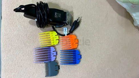 Used Electric Hair Clipper with 6 Attachment Guards