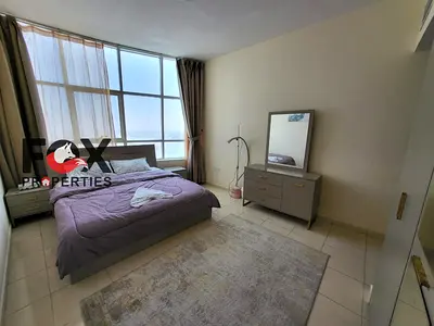 Furnished 2BHK for rent in Orient Towers with 2 bathrooms, sea view, separate hall and free parking. AED 47,000 yearly, security deposit cheque.