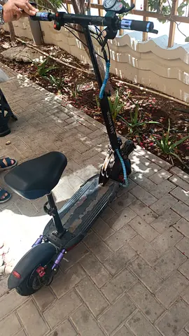 Used Electric Scooter with Seat — Good Working Condition