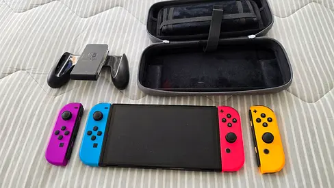 Nintendo Switch OLED - 4 Controllers + Case + Dock and more -  Barely Used - Just Like New