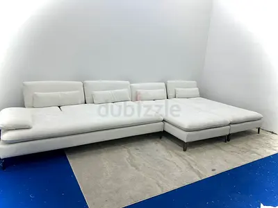 Selling rochebobois white color lshape sofa