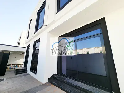 Available brand new modern finish 4 bedrooms villa al master semi independent with maids room covered car parking fitted kitchen for rent in mirdif