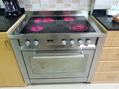 Stainless steel Ariston electric range with ceramic hob and oven - good condition