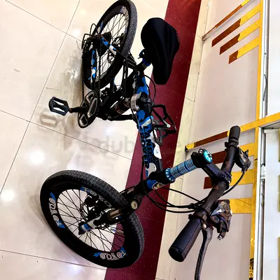 Used foldable mountain bike - 20 wheels, front suspension, good condition