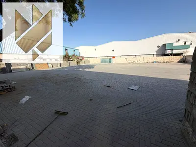 Yard in Industrial 13 10000 sqft interlock wide access main road 54KW power with office rent AED 200000 yearly 4 payments cheque deposit