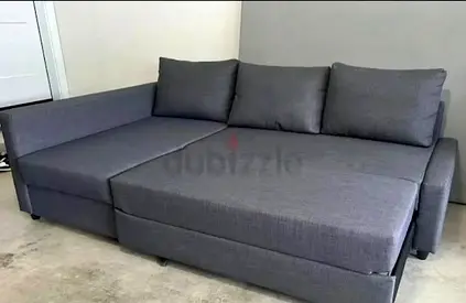 Grey L-shaped Sofa Bed with Storage - Good Condition