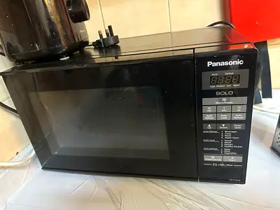 Used Panasonic Solo Microwave - Compact Black, Good Working Condition