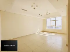 Spacious 3BHK Apartment With Maid Room cabinet Open View back side view At Al Khan corniche