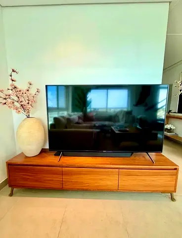 Media unit with 3 large drawers.