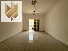 For annual rent: a one-bedroom apartment in Al Zahia with a stunning view, spacious rooms, and excel