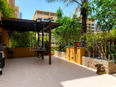 Spacious 3BR Apartment | Courtyard with Patio |