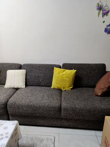 Dark grey 4-seater fabric sofa in good condition