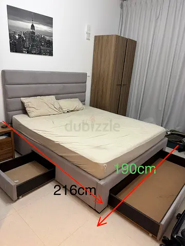 Grey upholstered double bed with storage drawers (190x216cm)