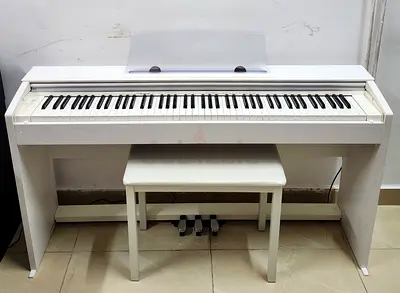 The Casio Privia PX-770 is an 88-key digital console piano designed for home use, featuring the AiR
