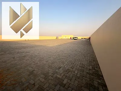 Industrial Yard for Rent in Al Sajaa | 20,000 Sq. Ft. | 25 kW Power Supply | Prime Location for Storage & Operations