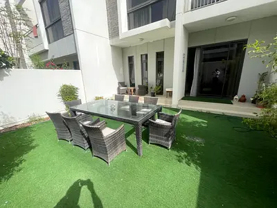 Outdoor rattan dining table set with 8 chairs - good condition