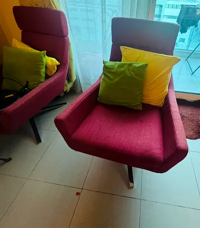 Pair of vintage-style red lounge chairs
