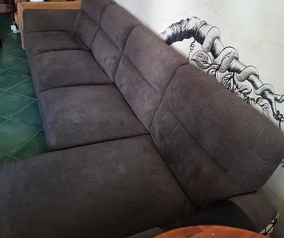 Large grey fabric L-shaped sectional sofa - comfortable, good condition. No damage, tears, or stains