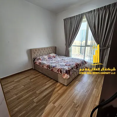 Luxurious two-bedroom apartment with a balcony and a sea view, fully furnished with new furniture, in Ajman - Al Rashidiya 1 - Oasis Towers