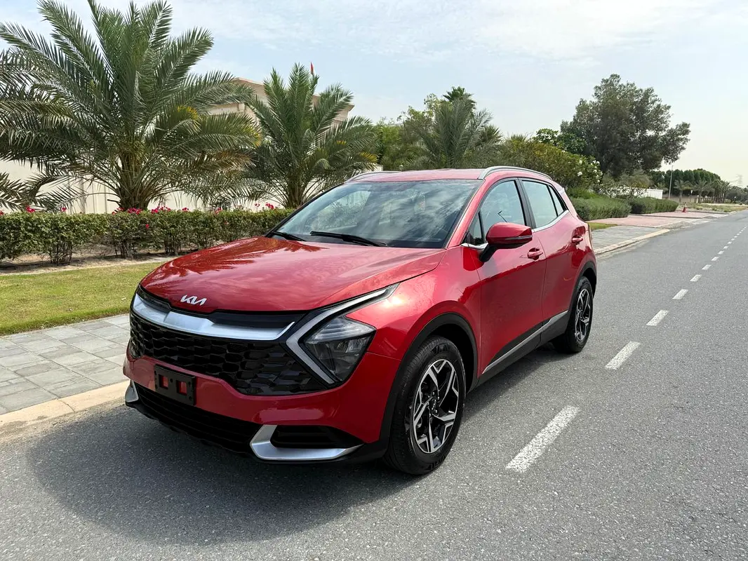 Kia Sportage 2023 — photo 1 of 14