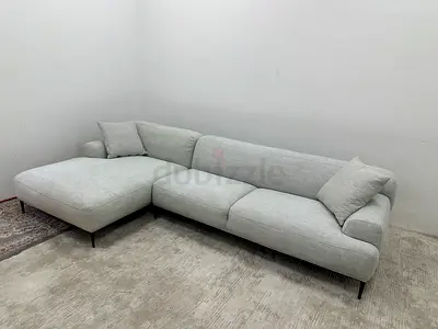Like new condition the loom collection lshape sofa