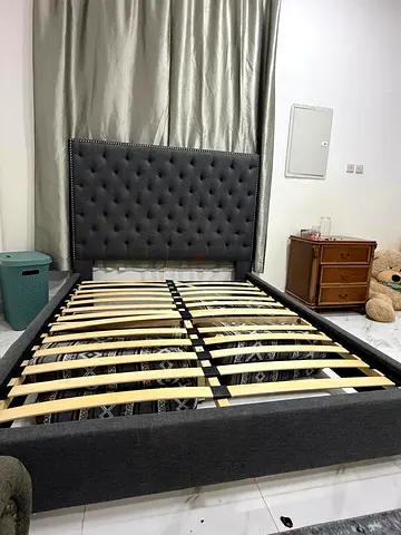 Queen size upholstered bed frame with tufted headboard — dark grey