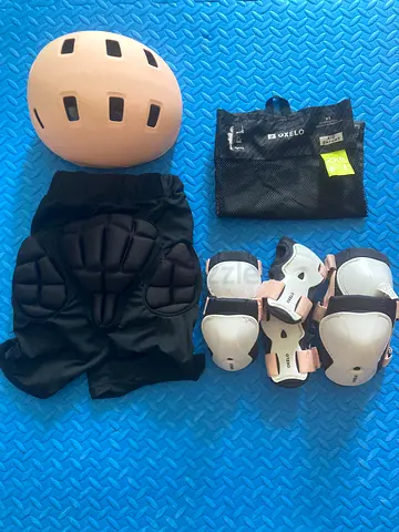 Decathlon protective helmet and pads set (helmet, knee/elbow/wrist pads, padded shorts)