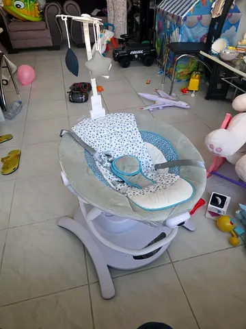 Baby swing/rocker with mobile - gently used