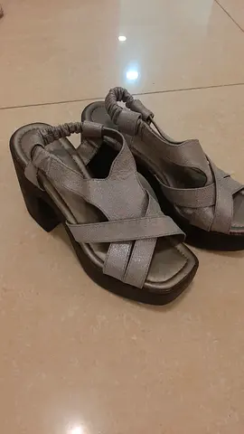 Silver platform heeled sandals, size unknown - gently used