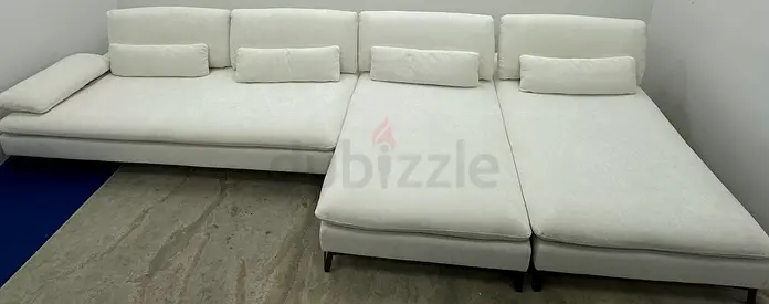 Brand new condition rochebobois white color lshape sofa